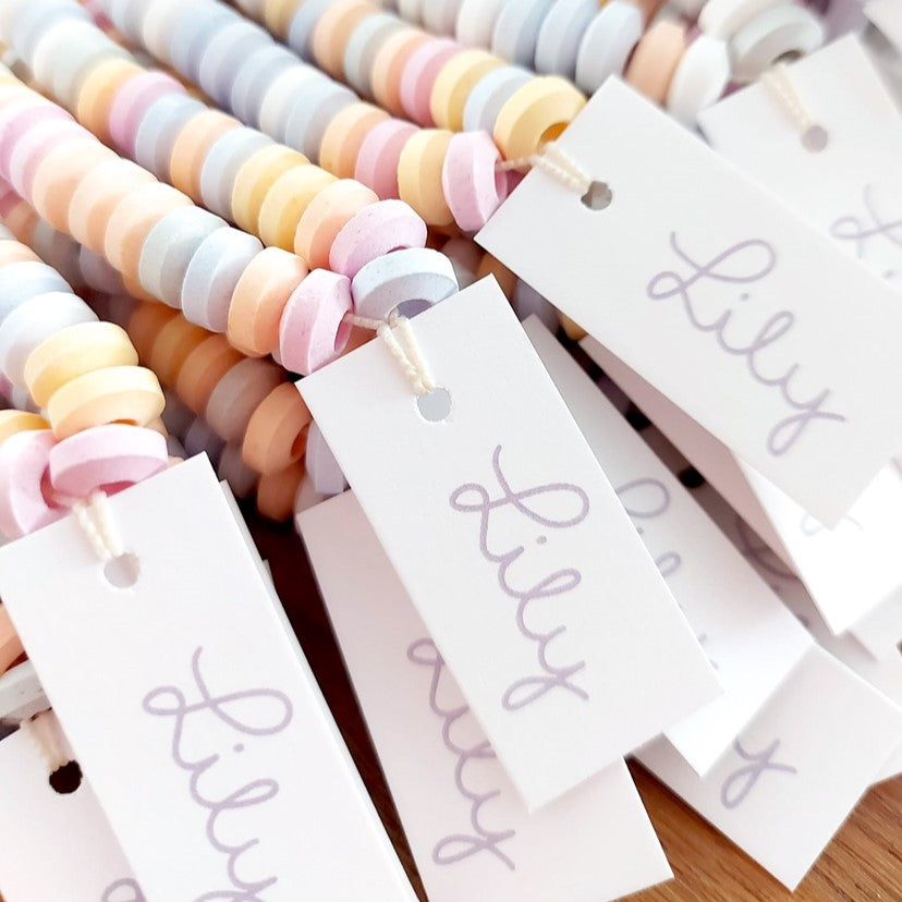 Snoepketting met label in stijl van geboortekaartje