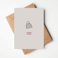 Minimalistische kerstkaart met illustratie van een muts en tekst warme wensen