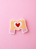 Schattige sticker met handen die een hartje vormen