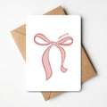 Witte wenskaart met roze strik, just married