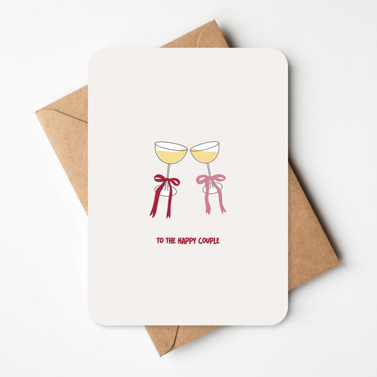 Wenskaart met de tekst 'To the Happy Couple', ideaal voor het feliciteren van een pasgetrouwd stel, met minimalistisch en stijlvol ontwerp