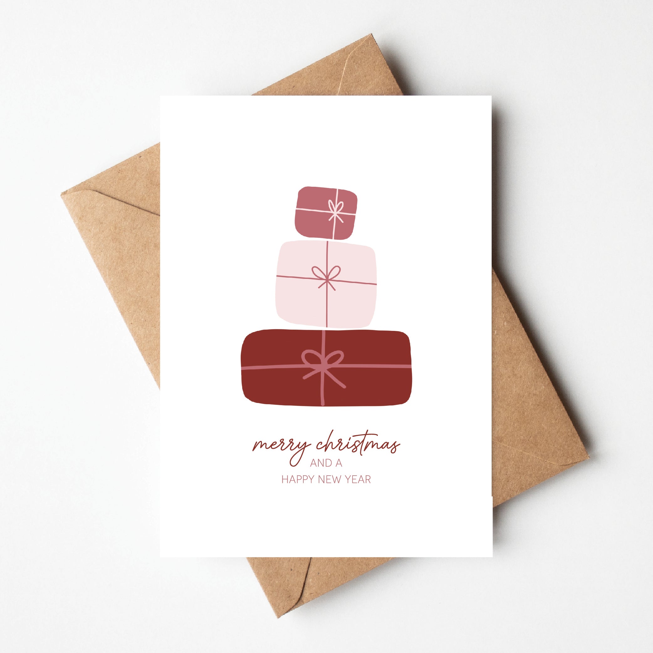 Kaartje kerst met cadeautjes en tekst merry christmas