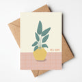 Kaartje voor felicitiatie van nieuwe woonst - illustratie van een plant en tekst new home